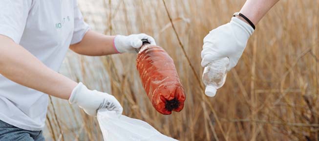 person collecting garbage